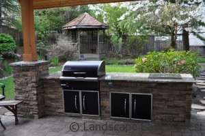 Cultured stone Traeger BBQ island with beverage cold well