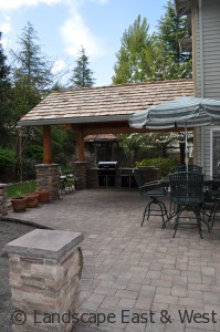 Attached roof with paver patio and cultured stone columns