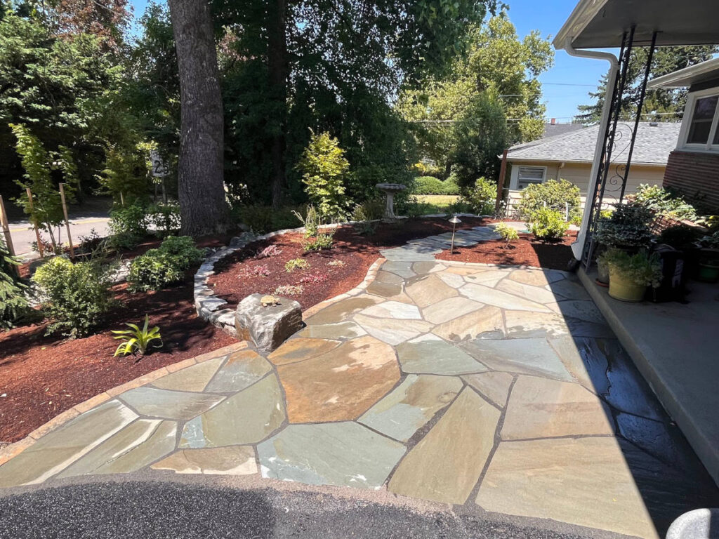 Custom pavers add drama and retaining walls keep plants and soil in place. We find beautiful solutions for any type of yard.